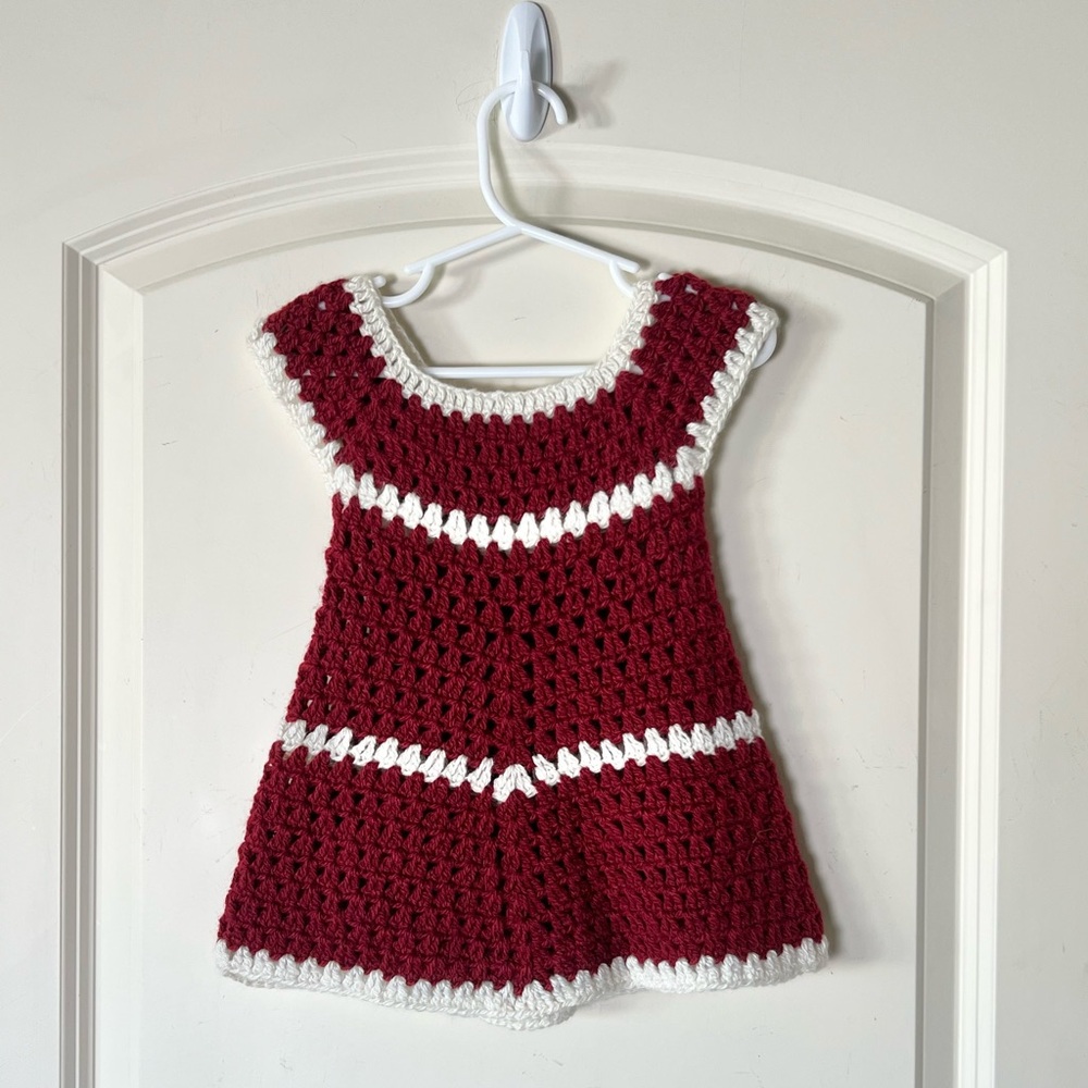 Handmade crocheted little girls dress in maroon and white